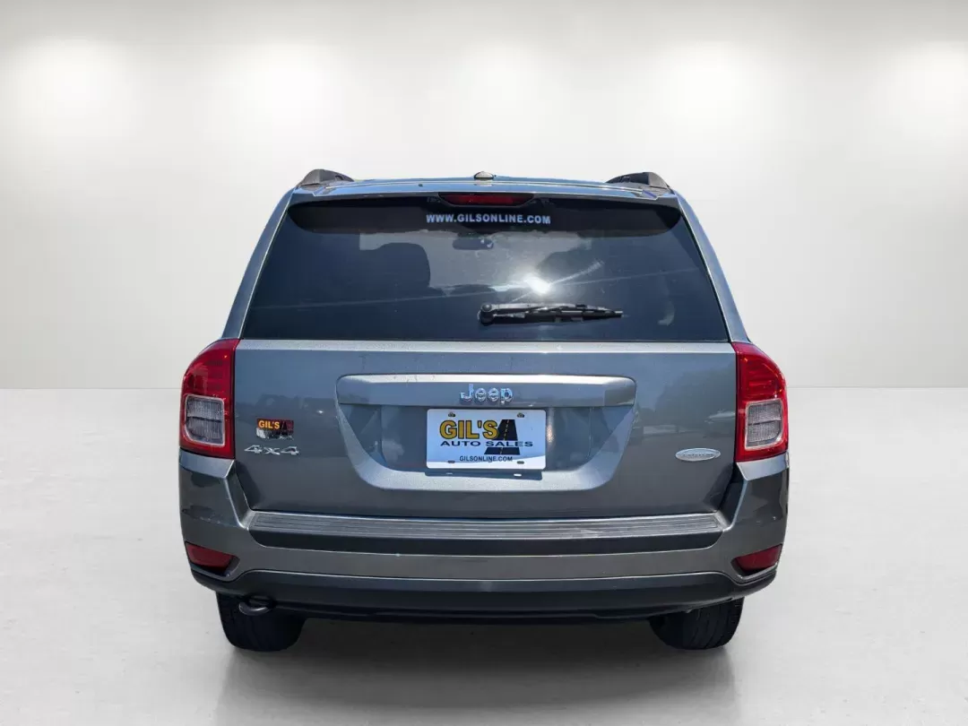 2012 /Dark Slate Gray Interior Jeep Compass Latitude (1C4NJDEBXCD) with an Gas I4 2.4L/144 engine, 1-Speed Continuously Variable Ratio transmission, located at 1430 Gateway Drive, Opelika, AL, 36801, (334) 239-0944, 32.637871, -85.409790 - 2012 Jeep Compass Latitude - Photo#5