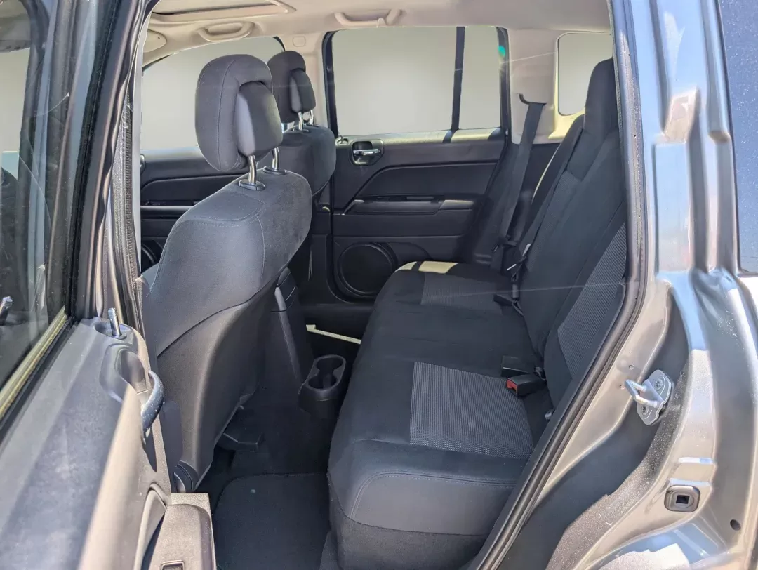 2012 /Dark Slate Gray Interior Jeep Compass Latitude (1C4NJDEBXCD) with an Gas I4 2.4L/144 engine, 1-Speed Continuously Variable Ratio transmission, located at 1430 Gateway Drive, Opelika, AL, 36801, (334) 239-0944, 32.637871, -85.409790 - 2012 Jeep Compass Latitude - Photo#10