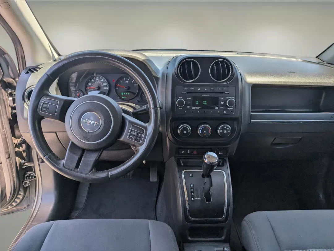 2012 /Dark Slate Gray Interior Jeep Compass Latitude (1C4NJDEBXCD) with an Gas I4 2.4L/144 engine, 1-Speed Continuously Variable Ratio transmission, located at 1430 Gateway Drive, Opelika, AL, 36801, (334) 239-0944, 32.637871, -85.409790 - 2012 Jeep Compass Latitude - Photo#11