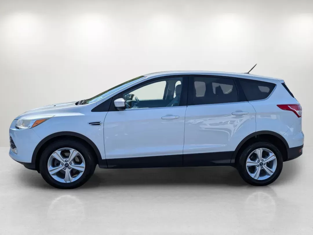 2015 Ford Escape SE (1FMCU0GX5FU) with an Intercooled Turbo Regular Unleaded I-4 1.6 L/98 engine, 6-Speed Automatic w/OD transmission, located at 1430 Gateway Drive, Opelika, AL, 36801, (334) 239-0944, 32.637871, -85.409790 - 2015 Ford Escape SE - Photo#7