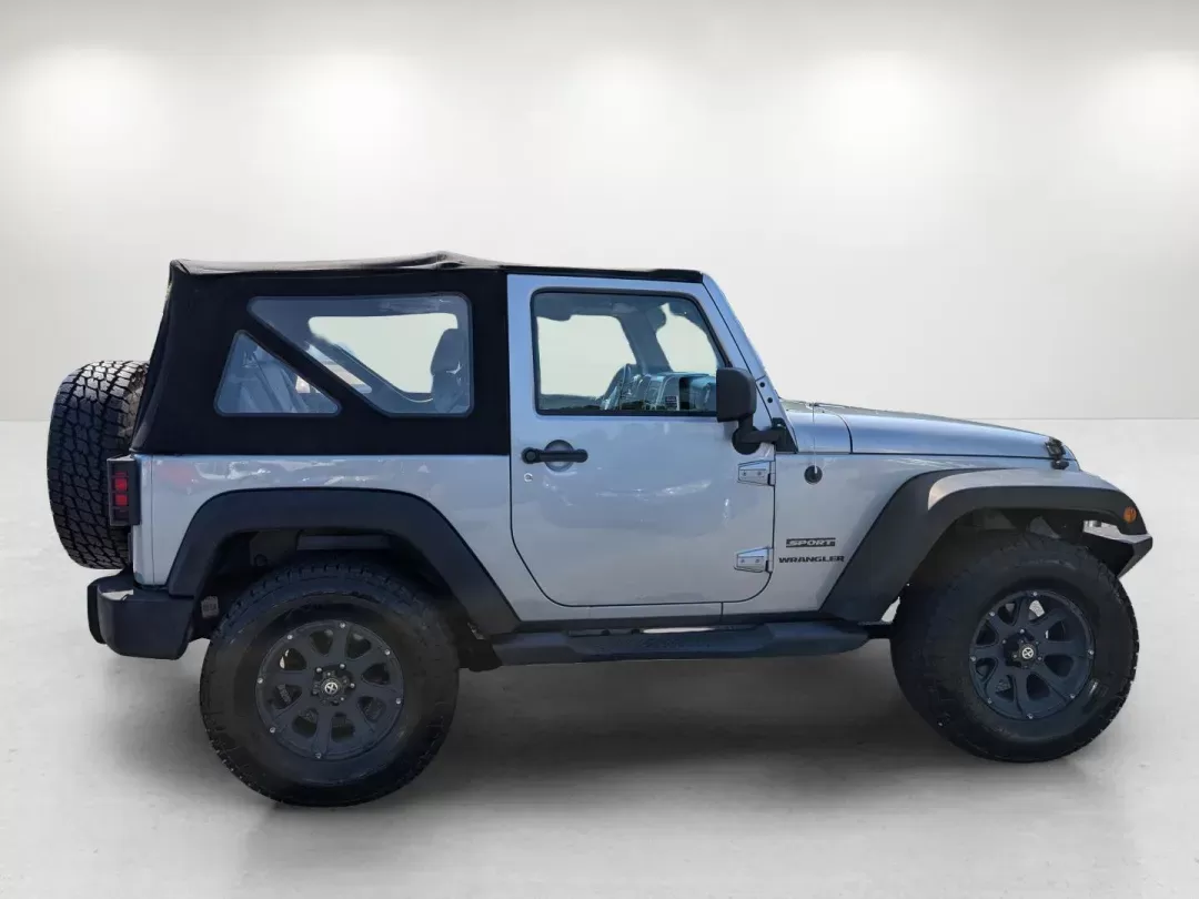 2014 /Black Jeep Wrangler Sport (1C4AJWAG7EL) with an Regular Unleaded V-6 3.6 L/220 engine, 5-Speed Automatic w/OD transmission, located at 3959 U.S. 80 W, Phenix City, AL, 36870, (334) 297-4885, 32.469296, -85.135185 - 2014 Jeep Wrangler Sport - Photo#4