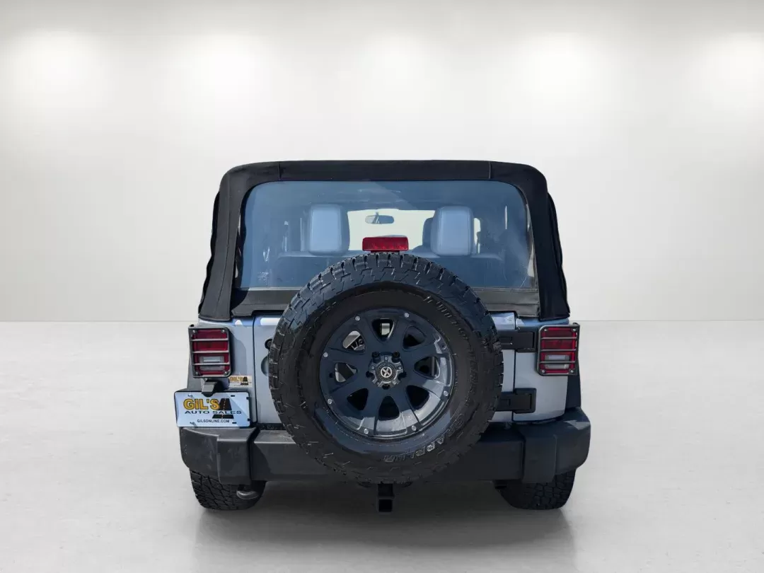 2014 /Black Jeep Wrangler Sport (1C4AJWAG7EL) with an Regular Unleaded V-6 3.6 L/220 engine, 5-Speed Automatic w/OD transmission, located at 3959 U.S. 80 W, Phenix City, AL, 36870, (334) 297-4885, 32.469296, -85.135185 - 2014 Jeep Wrangler Sport - Photo#6