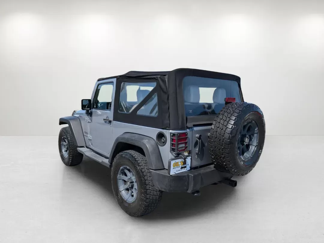 2014 /Black Jeep Wrangler Sport (1C4AJWAG7EL) with an Regular Unleaded V-6 3.6 L/220 engine, 5-Speed Automatic w/OD transmission, located at 3959 U.S. 80 W, Phenix City, AL, 36870, (334) 297-4885, 32.469296, -85.135185 - 2014 Jeep Wrangler Sport - Photo#7