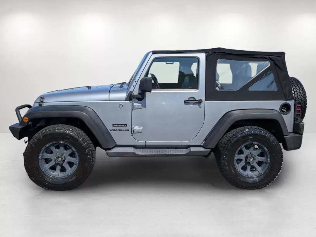 2014 /Black Jeep Wrangler Sport (1C4AJWAG7EL) with an Regular Unleaded V-6 3.6 L/220 engine, 5-Speed Automatic w/OD transmission, located at 3959 U.S. 80 W, Phenix City, AL, 36870, (334) 297-4885, 32.469296, -85.135185 - 2014 Jeep Wrangler Sport - Photo#8