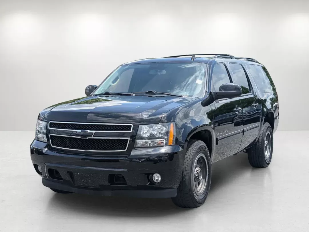 2013 /Ebony Chevrolet Suburban LT (1GNSCJE02DR) with an Gas/Ethanol V8 5.3L/323 engine, 6-Speed Automatic transmission, located at 3959 U.S. 80 W, Phenix City, AL, 36870, (334) 297-4885, 32.469296, -85.135185 - 2013 Chevrolet Suburban LT - Photo#1