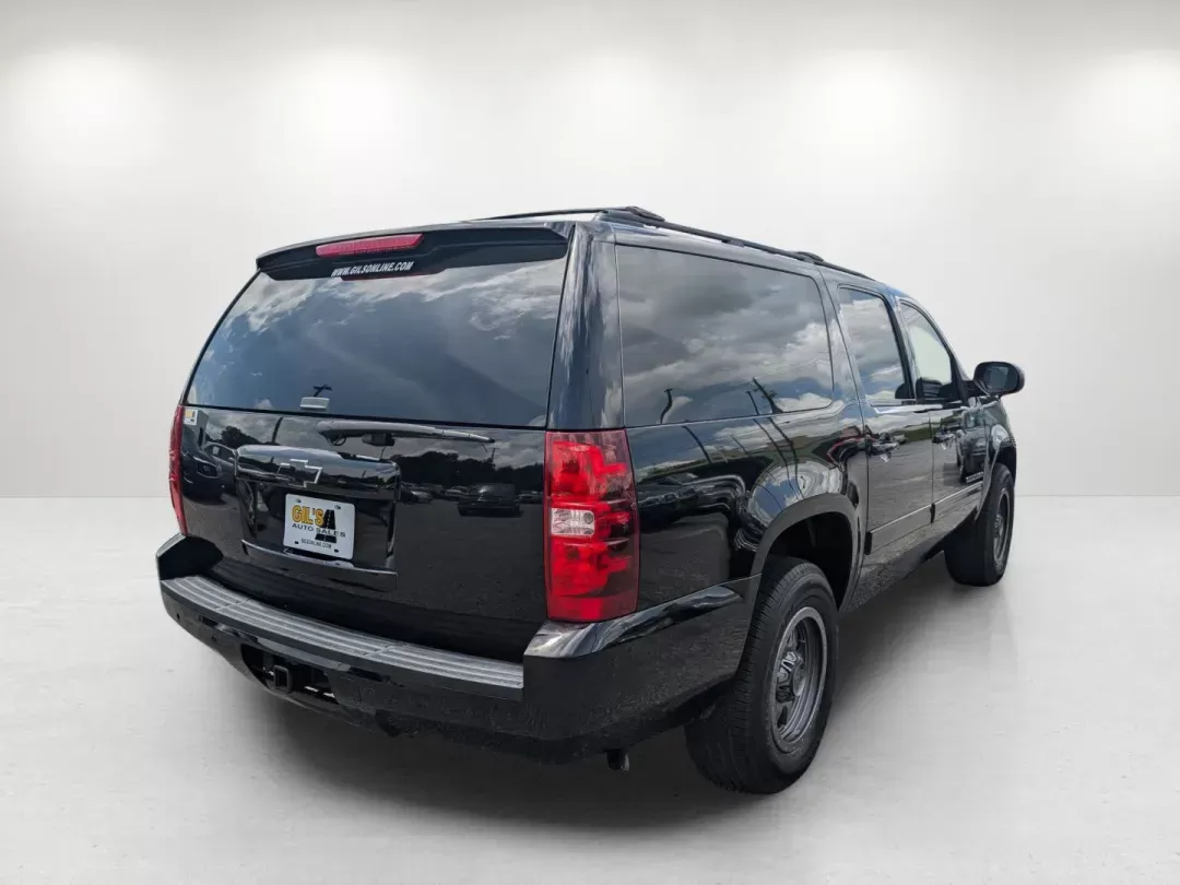 2013 /Ebony Chevrolet Suburban LT (1GNSCJE02DR) with an Gas/Ethanol V8 5.3L/323 engine, 6-Speed Automatic transmission, located at 3959 U.S. 80 W, Phenix City, AL, 36870, (334) 297-4885, 32.469296, -85.135185 - 2013 Chevrolet Suburban LT - Photo#5
