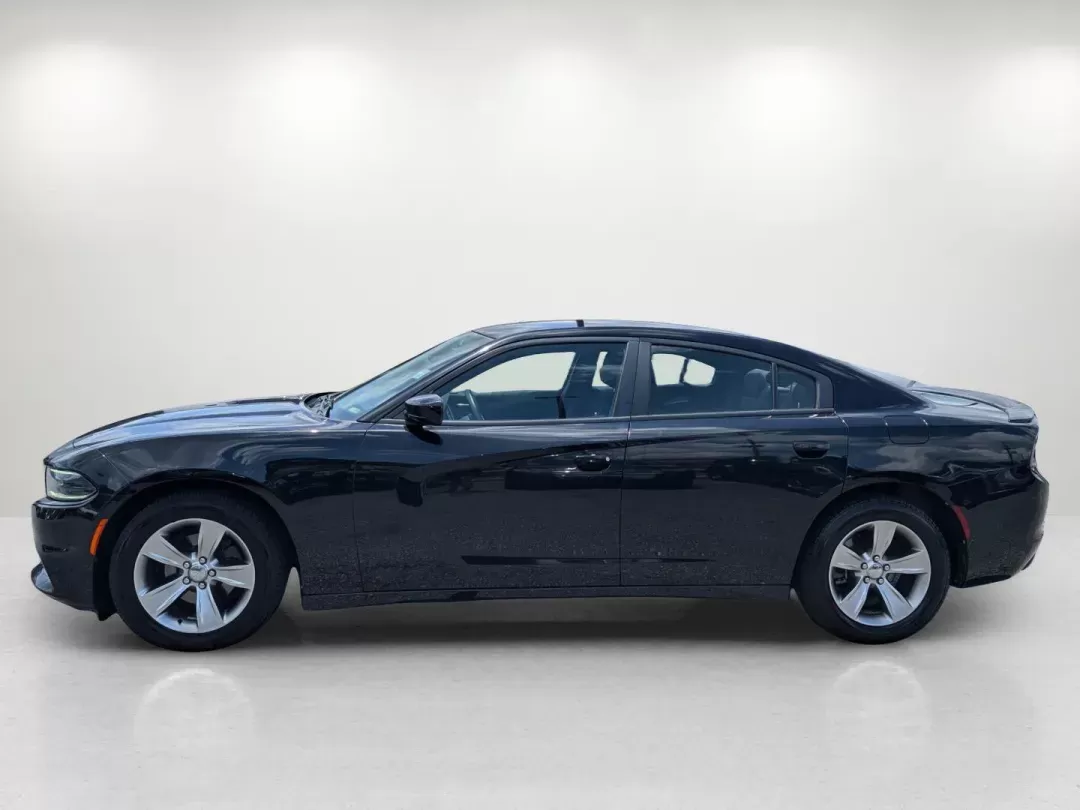 2015 /Black Dodge Charger SE (2C3CDXBG0FH) with an Regular Unleaded V-6 3.6 L/220 engine, 8-Speed Automatic w/OD transmission, located at 3959 U.S. 80 W, Phenix City, AL, 36870, (334) 297-4885, 32.469296, -85.135185 - 2015 Dodge Charger SE - Photo#7