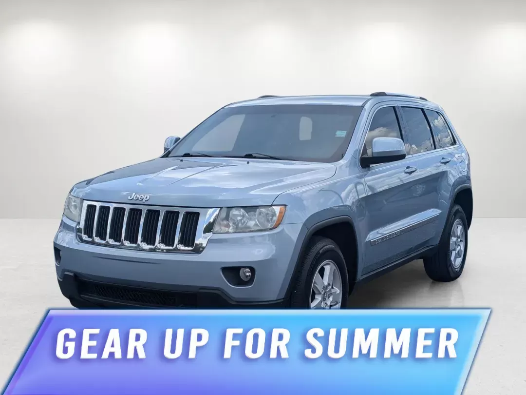 2013 /Black Jeep Grand Cherokee Laredo (1C4RJEAG2DC) with an Gas/Ethanol V6 3.6L/220 engine, 5-Speed Automatic transmission, located at 3959 U.S. 80 W, Phenix City, AL, 36870, (334) 297-4885, 32.469296, -85.135185 - 2013 Jeep Grand Cherokee Laredo - Photo#0
