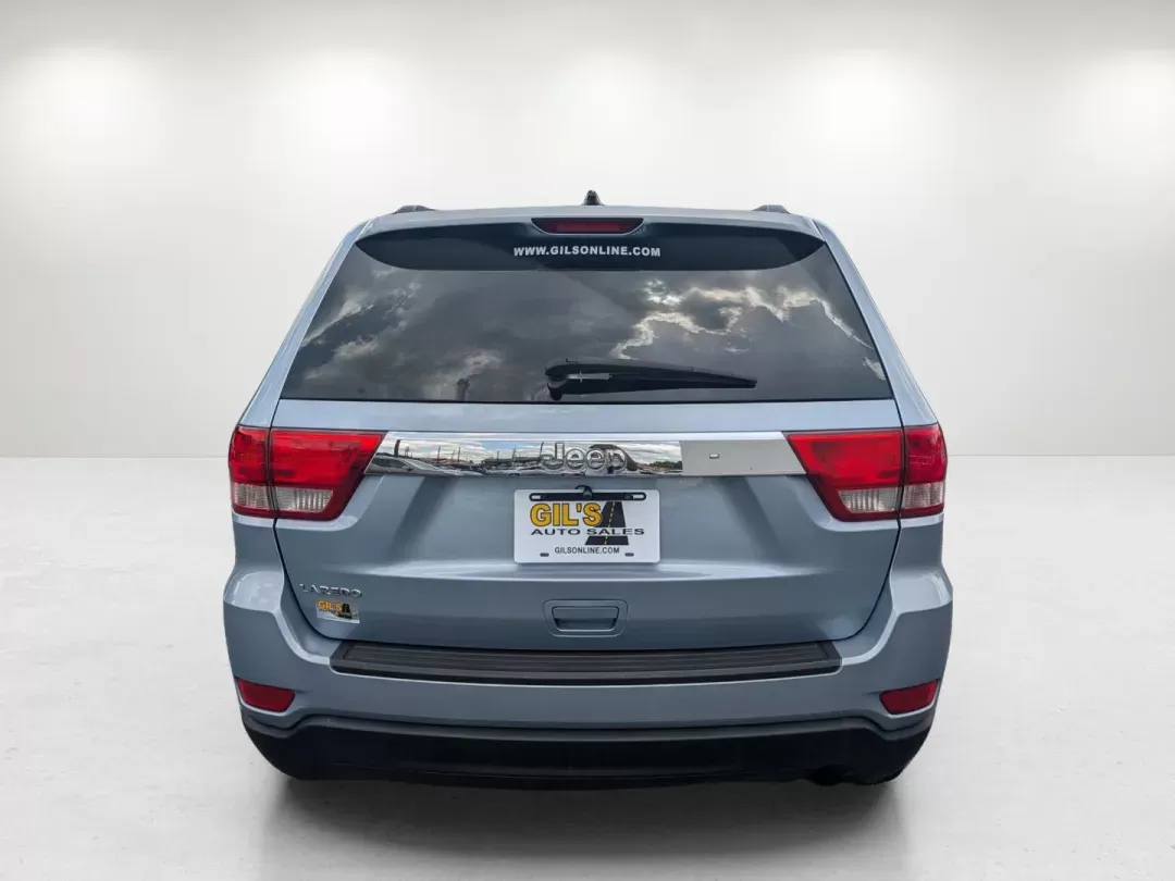 2013 /Black Jeep Grand Cherokee Laredo (1C4RJEAG2DC) with an Gas/Ethanol V6 3.6L/220 engine, 5-Speed Automatic transmission, located at 3959 U.S. 80 W, Phenix City, AL, 36870, (334) 297-4885, 32.469296, -85.135185 - 2013 Jeep Grand Cherokee Laredo - Photo#5