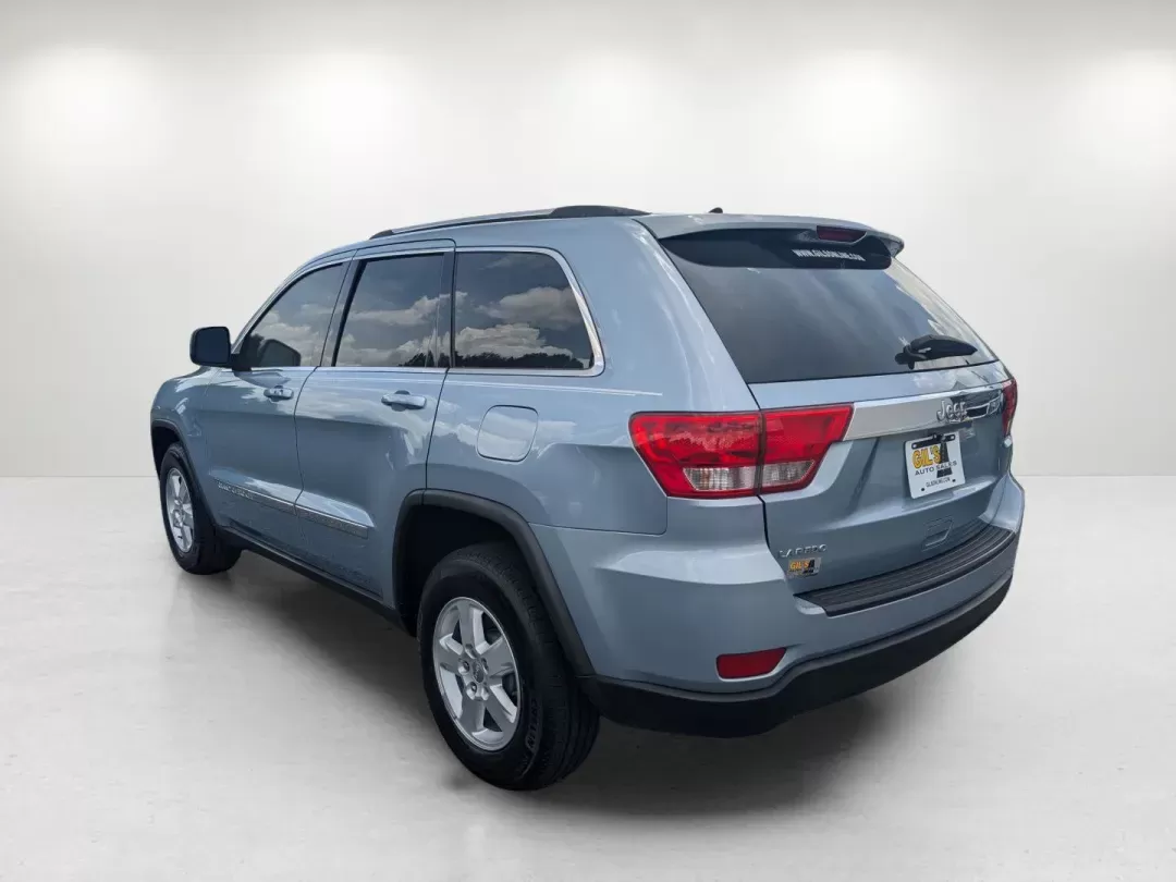 2013 /Black Jeep Grand Cherokee Laredo (1C4RJEAG2DC) with an Gas/Ethanol V6 3.6L/220 engine, 5-Speed Automatic transmission, located at 3959 U.S. 80 W, Phenix City, AL, 36870, (334) 297-4885, 32.469296, -85.135185 - 2013 Jeep Grand Cherokee Laredo - Photo#6