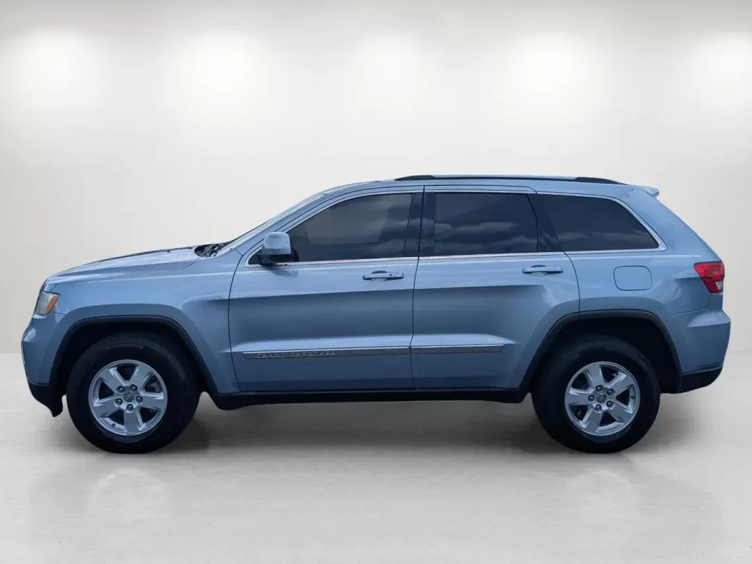 2013 /Black Jeep Grand Cherokee Laredo (1C4RJEAG2DC) with an Gas/Ethanol V6 3.6L/220 engine, 5-Speed Automatic transmission, located at 3959 U.S. 80 W, Phenix City, AL, 36870, (334) 297-4885, 32.469296, -85.135185 - 2013 Jeep Grand Cherokee Laredo - Photo#7