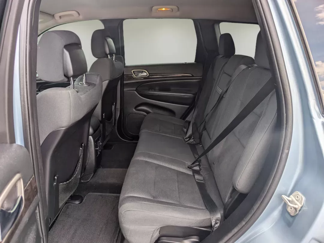2013 /Black Jeep Grand Cherokee Laredo (1C4RJEAG2DC) with an Gas/Ethanol V6 3.6L/220 engine, 5-Speed Automatic transmission, located at 3959 U.S. 80 W, Phenix City, AL, 36870, (334) 297-4885, 32.469296, -85.135185 - 2013 Jeep Grand Cherokee Laredo - Photo#10