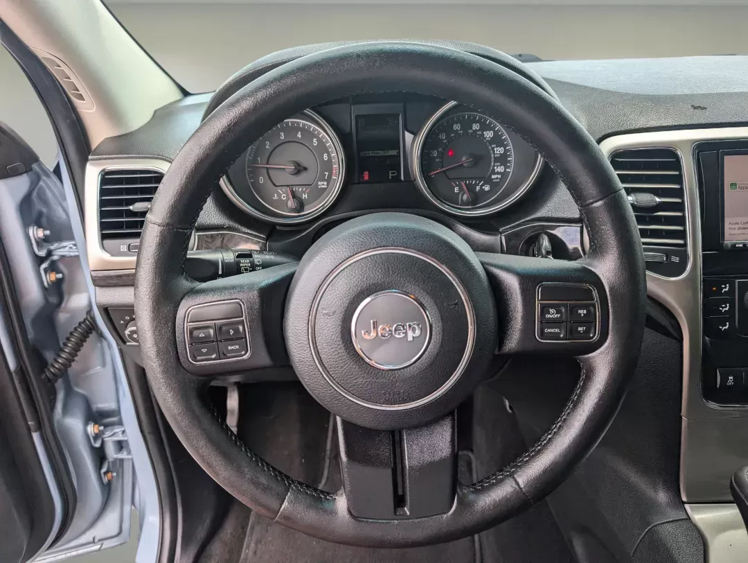 2013 /Black Jeep Grand Cherokee Laredo (1C4RJEAG2DC) with an Gas/Ethanol V6 3.6L/220 engine, 5-Speed Automatic transmission, located at 3959 U.S. 80 W, Phenix City, AL, 36870, (334) 297-4885, 32.469296, -85.135185 - 2013 Jeep Grand Cherokee Laredo - Photo#15