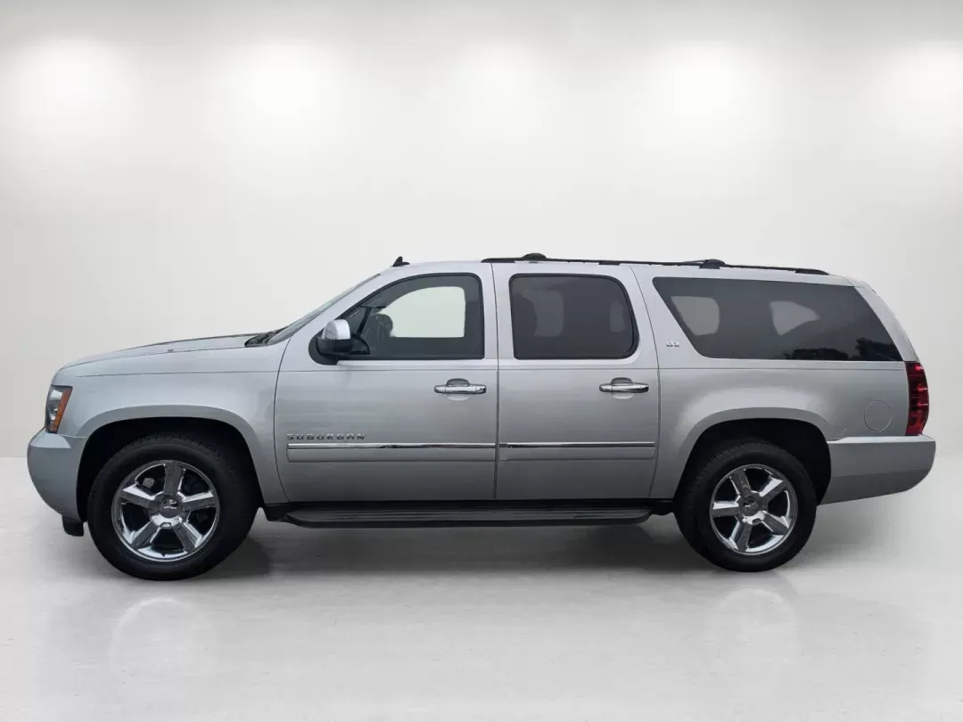 2012 /Ebony Chevrolet Suburban LTZ (1GNSCKE05CR) with an Gas/Ethanol V8 5.3L/323 engine, 6-Speed Automatic transmission, located at 3959 U.S. 80 W, Phenix City, AL, 36870, (334) 297-4885, 32.469296, -85.135185 - 2012 Chevrolet Suburban LTZ - Photo#7