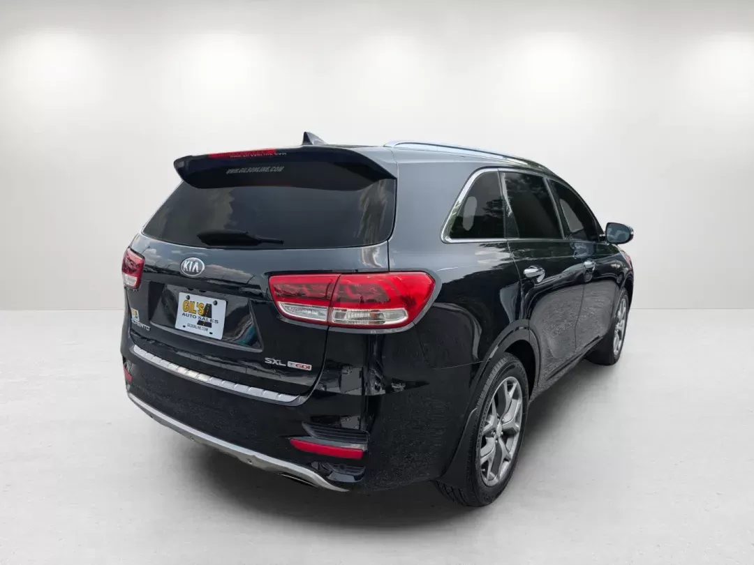2016 /Satin Black Kia Sorento SXL (5XYPK4A18GG) with an Intercooled Turbo Regular Unleaded I-4 2.0 L/122 engine, 6-Speed Automatic w/OD transmission, located at 804 22nd Ave, Phenix City, AL, 36870, (334) 297-1860, 32.484749, -85.024475 - 2016 Kia Sorento SXL - Photo#4