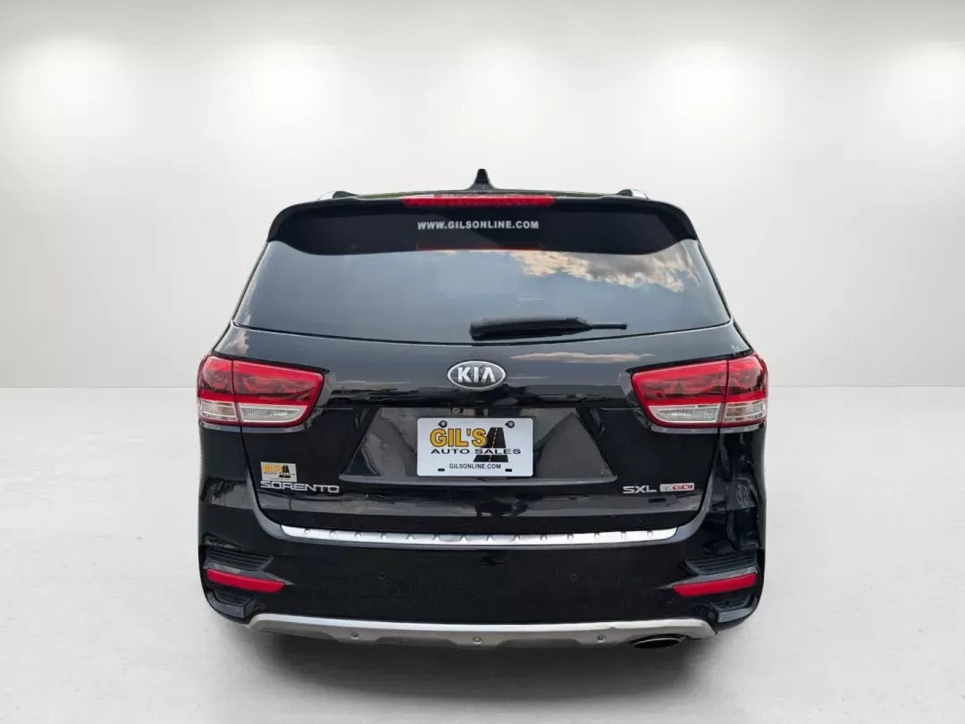 2016 /Satin Black Kia Sorento SXL (5XYPK4A18GG) with an Intercooled Turbo Regular Unleaded I-4 2.0 L/122 engine, 6-Speed Automatic w/OD transmission, located at 804 22nd Ave, Phenix City, AL, 36870, (334) 297-1860, 32.484749, -85.024475 - 2016 Kia Sorento SXL - Photo#5