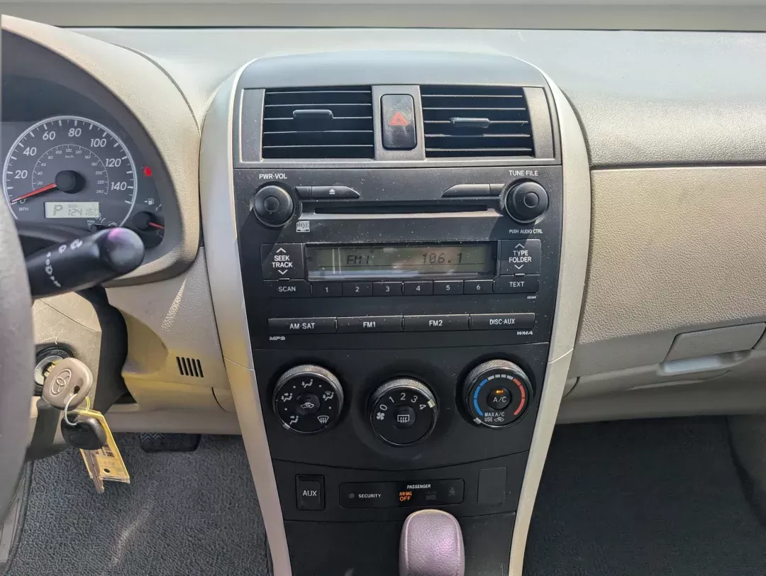 2009 Toyota Corolla LE (1NXBU40E89Z) with an Gas I4 1.8L/110 engine, 4-Speed Automatic w/OD transmission, located at 804 22nd Ave, Phenix City, AL, 36870, (334) 297-1860, 32.484749, -85.024475 - 2009 Toyota Corolla LE - Photo#14