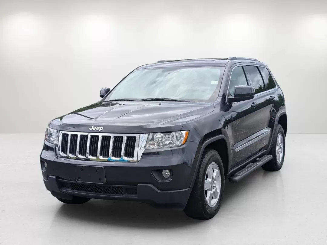 2013 /Black Jeep Grand Cherokee Laredo (1C4RJFAG6DC) with an Gas/Ethanol V6 3.6L/220 engine, 5-Speed Automatic transmission, located at 3959 U.S. 80 W, Phenix City, AL, 36870, (334) 297-4885, 32.469296, -85.135185 - 2013 Jeep Grand Cherokee Laredo - Photo#1