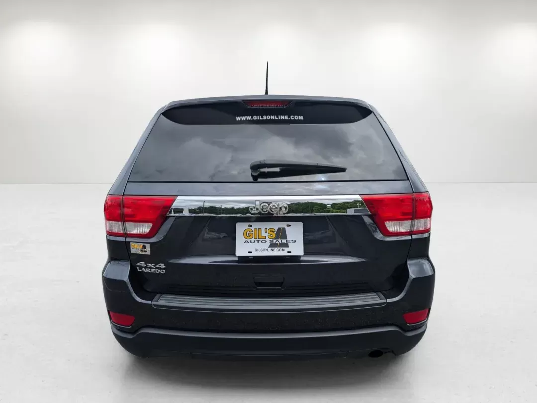 2013 /Black Jeep Grand Cherokee Laredo (1C4RJFAG6DC) with an Gas/Ethanol V6 3.6L/220 engine, 5-Speed Automatic transmission, located at 3959 U.S. 80 W, Phenix City, AL, 36870, (334) 297-4885, 32.469296, -85.135185 - 2013 Jeep Grand Cherokee Laredo - Photo#6
