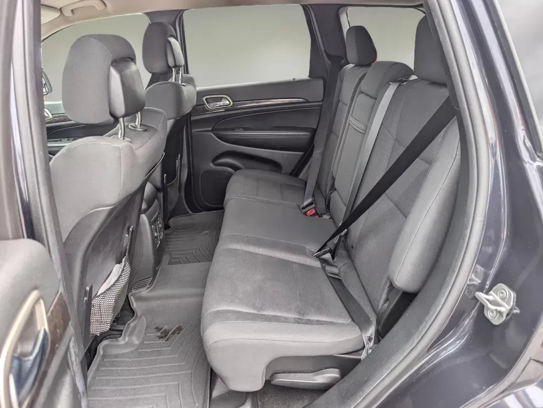 2013 /Black Jeep Grand Cherokee Laredo (1C4RJFAG6DC) with an Gas/Ethanol V6 3.6L/220 engine, 5-Speed Automatic transmission, located at 3959 U.S. 80 W, Phenix City, AL, 36870, (334) 297-4885, 32.469296, -85.135185 - 2013 Jeep Grand Cherokee Laredo - Photo#11