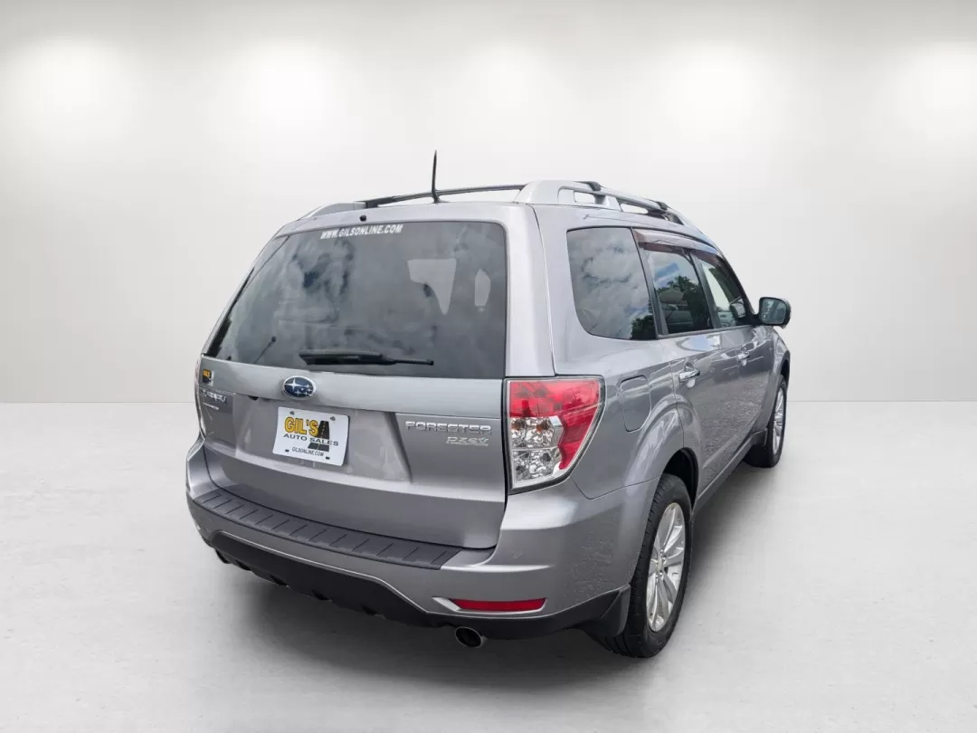 2011 Subaru Forester 2.5X Touring (JF2SHAGC8BH) with an Other engine, located at 5115 14th Ave., Columbus, GA, 31904, (706) 323-0345, 32.511494, -84.971046 - **Explore Adventure with the 2011 Subaru Forester at Gils Auto!**<br /> <br /> Are you ready to elevate your lifestyle and take every road trip to the next level? The 2011 Subaru Forester, available now at Gils Auto in Phenix City, AL, is the ideal SUV for families, commuters, and adventurous spirit - Photo#4