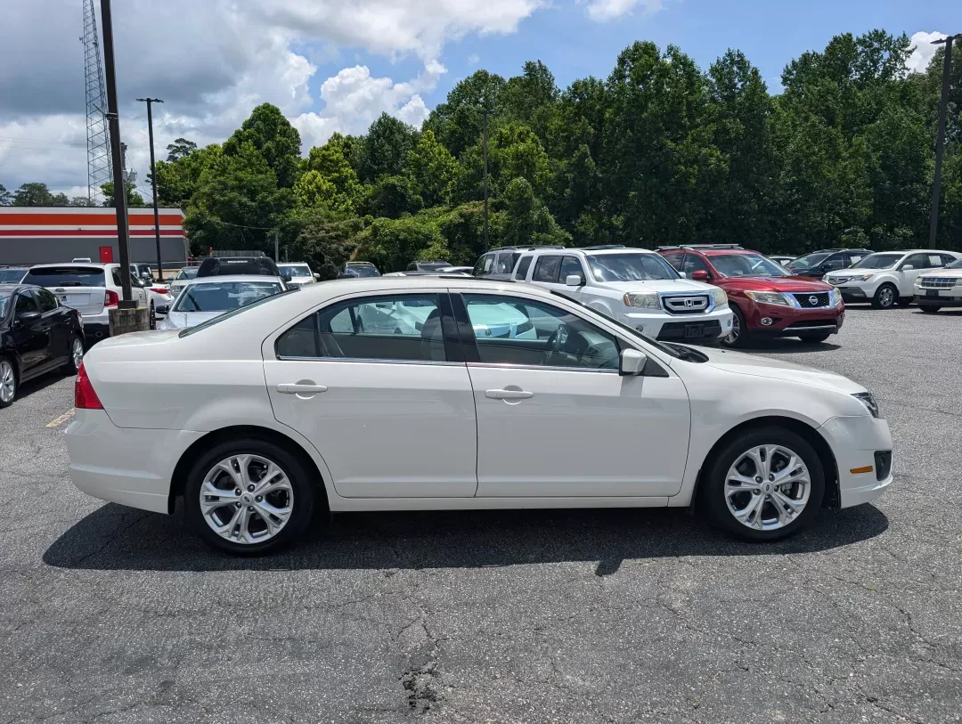 2012 Ford Fusion SE (3FAHP0HAXCR) with an Gas I4 2.5L/152 engine, 6-Speed Automatic transmission, located at 3959 U.S. 80 W, Phenix City, AL, 36870, (334) 297-4885, 32.469296, -85.135185 - 2012 Ford Fusion SE - Photo#3