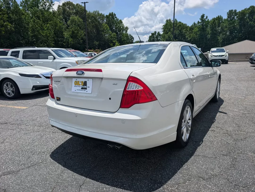 2012 Ford Fusion SE (3FAHP0HAXCR) with an Gas I4 2.5L/152 engine, 6-Speed Automatic transmission, located at 3959 U.S. 80 W, Phenix City, AL, 36870, (334) 297-4885, 32.469296, -85.135185 - 2012 Ford Fusion SE - Photo#4