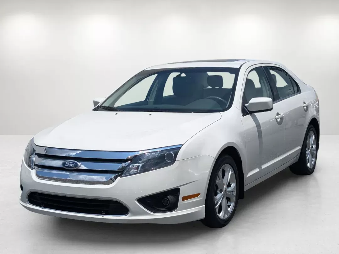 2012 Ford Fusion SE (3FAHP0HAXCR) with an Gas I4 2.5L/152 engine, 6-Speed Automatic transmission, located at 3959 U.S. 80 W, Phenix City, AL, 36870, (334) 297-4885, 32.469296, -85.135185 - **Your Next Adventure Awaits: 2012 Ford Fusion SE at Gils Auto - Phenix City, AL!**<br /> <br /> Are you searching for the perfect blend of reliability, comfort, and style for your daily adventures? Look no further! The 2012 Ford Fusion SE is not just a sedan; it's your ticket to a stress-free commu - Photo#1