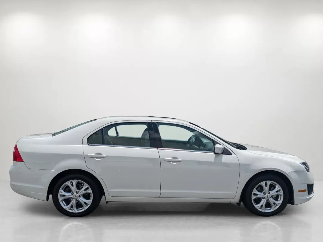2012 Ford Fusion SE (3FAHP0HAXCR) with an Gas I4 2.5L/152 engine, 6-Speed Automatic transmission, located at 3959 U.S. 80 W, Phenix City, AL, 36870, (334) 297-4885, 32.469296, -85.135185 - **Your Next Adventure Awaits: 2012 Ford Fusion SE at Gils Auto - Phenix City, AL!**<br /> <br /> Are you searching for the perfect blend of reliability, comfort, and style for your daily adventures? Look no further! The 2012 Ford Fusion SE is not just a sedan; it's your ticket to a stress-free commu - Photo#4