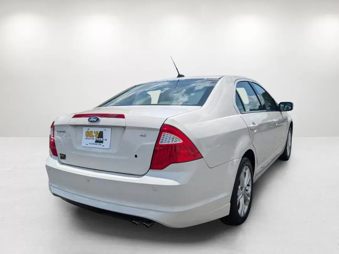 2012 Ford Fusion SE (3FAHP0HAXCR) with an Gas I4 2.5L/152 engine, 6-Speed Automatic transmission, located at 3959 U.S. 80 W, Phenix City, AL, 36870, (334) 297-4885, 32.469296, -85.135185 - **Your Next Adventure Awaits: 2012 Ford Fusion SE at Gils Auto - Phenix City, AL!**<br /> <br /> Are you searching for the perfect blend of reliability, comfort, and style for your daily adventures? Look no further! The 2012 Ford Fusion SE is not just a sedan; it's your ticket to a stress-free commu - Photo#5