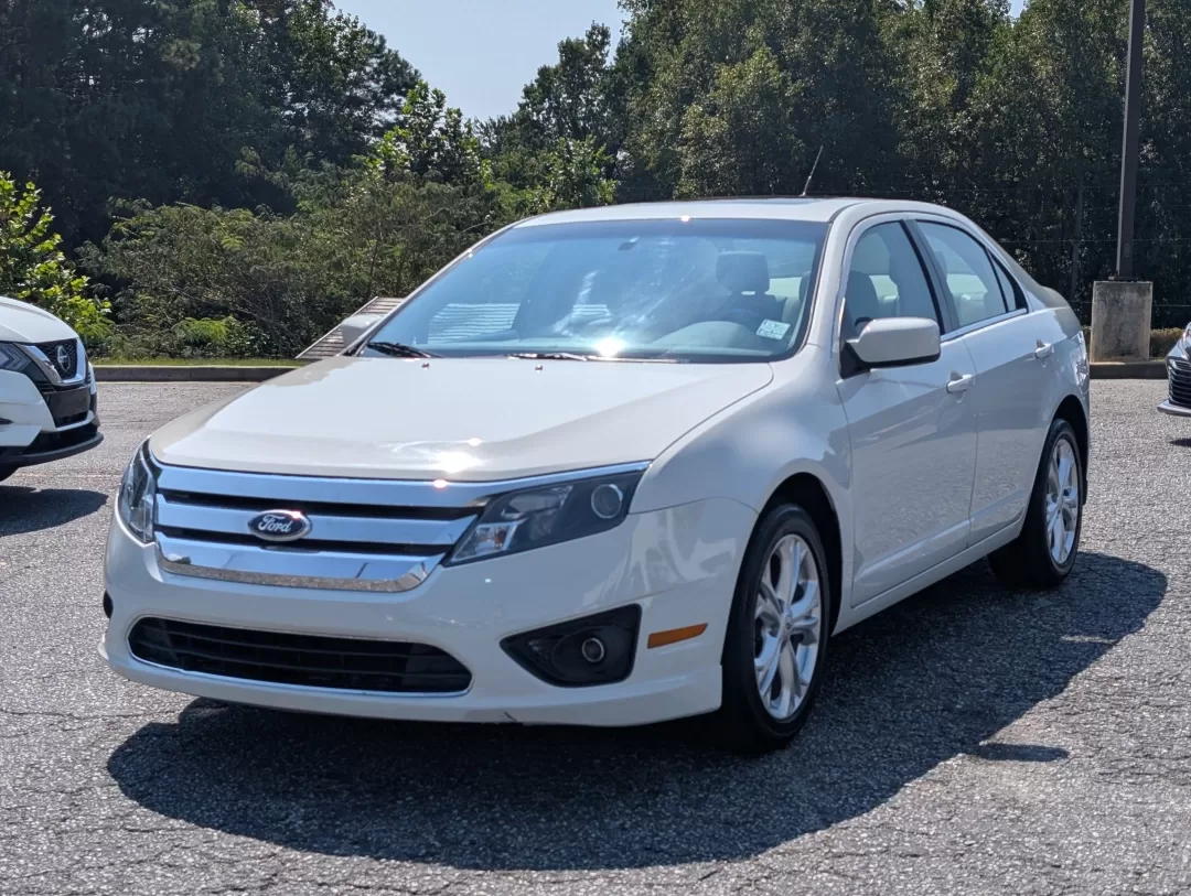 2012 Ford Fusion SE (3FAHP0HAXCR) with an Other engine, located at 3959 U.S. 80 W, Phenix City, AL, 36870, (334) 297-4885, 32.469296, -85.135185 - **Discover Your Next Adventure with the 2012 Ford Fusion SE at Gils Auto in Phenix City, AL!**<br /> <br /> Are you looking for a reliable and stylish sedan that perfectly balances comfort and performance? The 2012 Ford Fusion SE is your perfect companion for everyday commutes or weekend getaways. W - Photo#1