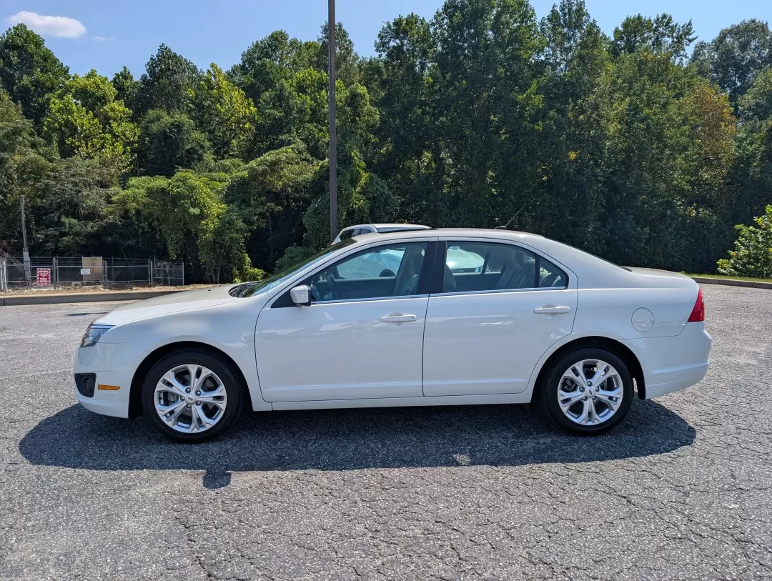 2012 Ford Fusion SE (3FAHP0HAXCR) with an Other engine, located at 3959 U.S. 80 W, Phenix City, AL, 36870, (334) 297-4885, 32.469296, -85.135185 - **Discover Your Next Adventure with the 2012 Ford Fusion SE at Gils Auto in Phenix City, AL!**<br /> <br /> Are you looking for a reliable and stylish sedan that perfectly balances comfort and performance? The 2012 Ford Fusion SE is your perfect companion for everyday commutes or weekend getaways. W - Photo#8