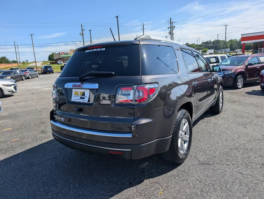 2015 /Ebony GMC Acadia SLE (1GKKRPKD9FJ) with an Gas V6 3.6L/220 engine, 6-Speed Automatic transmission, located at 3959 U.S. 80 W, Phenix City, AL, 36870, (334) 297-4885, 32.469296, -85.135185 - 2015 GMC Acadia SLE - Photo#4