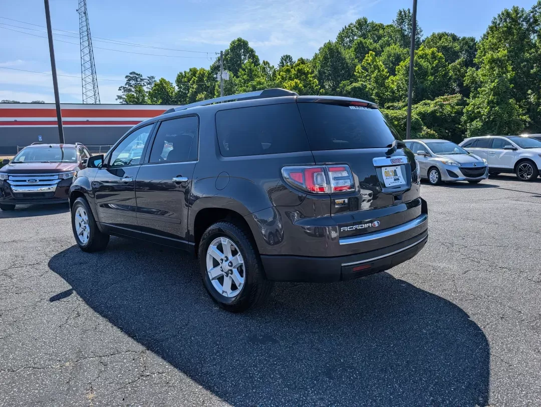 2015 /Ebony GMC Acadia SLE (1GKKRPKD9FJ) with an Gas V6 3.6L/220 engine, 6-Speed Automatic transmission, located at 3959 U.S. 80 W, Phenix City, AL, 36870, (334) 297-4885, 32.469296, -85.135185 - 2015 GMC Acadia SLE - Photo#6