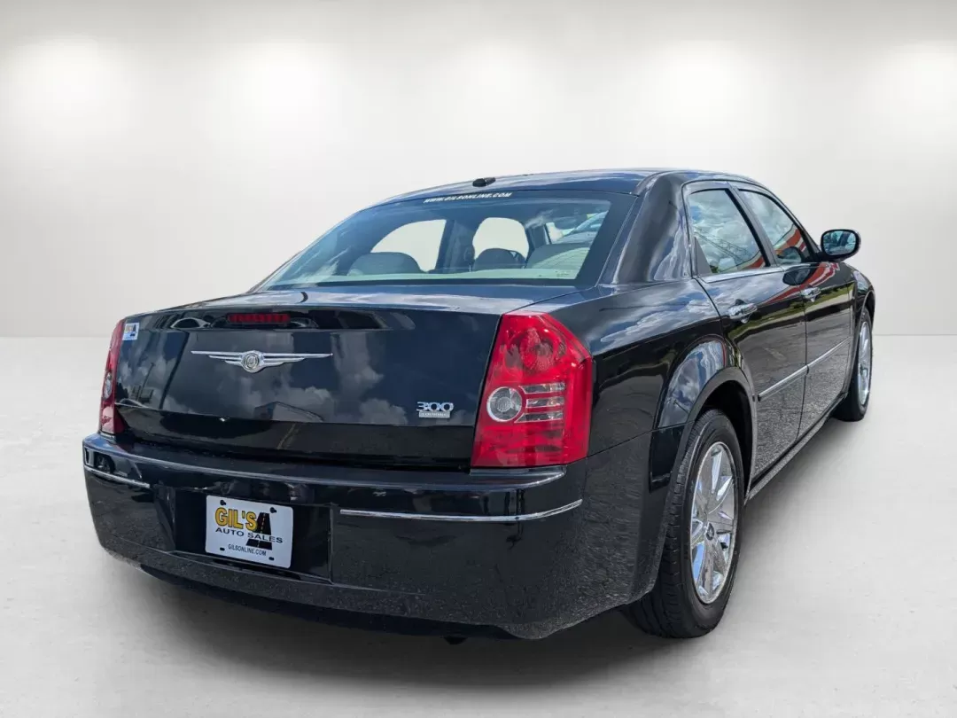 2010 /Dark Khaki/Light Gray Stone Chrysler 300 Touring Signature (2C3CA5CV9AH) with an Other engine, located at 1430 Gateway Drive, Opelika, AL, 36801, (334) 239-0944, 32.637871, -85.409790 - **Elevate Your Driving Experience with the 2010 Chrysler 300 Touring Signature at Gils Auto - Phenix City #2!**<br /> <br /> Are you in search of a sophisticated sedan that perfectly balances style, comfort, and performance? Look no further than the 2010 Chrysler 300 Touring Signature, available now - Photo#4