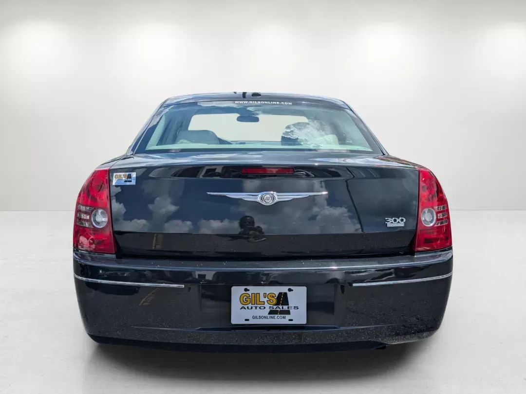 2010 /Dark Khaki/Light Gray Stone Chrysler 300 Touring Signature (2C3CA5CV9AH) with an Other engine, located at 1430 Gateway Drive, Opelika, AL, 36801, (334) 239-0944, 32.637871, -85.409790 - **Elevate Your Driving Experience with the 2010 Chrysler 300 Touring Signature at Gils Auto - Phenix City #2!**<br /> <br /> Are you in search of a sophisticated sedan that perfectly balances style, comfort, and performance? Look no further than the 2010 Chrysler 300 Touring Signature, available now - Photo#5