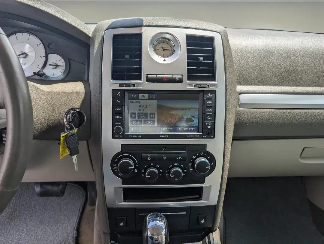 2010 /Dark Khaki/Light Gray Stone Chrysler 300 Touring Signature (2C3CA5CV9AH) with an Other engine, located at 1430 Gateway Drive, Opelika, AL, 36801, (334) 239-0944, 32.637871, -85.409790 - **Elevate Your Driving Experience with the 2010 Chrysler 300 Touring Signature at Gils Auto - Phenix City #2!**<br /> <br /> Are you in search of a sophisticated sedan that perfectly balances style, comfort, and performance? Look no further than the 2010 Chrysler 300 Touring Signature, available now - Photo#13