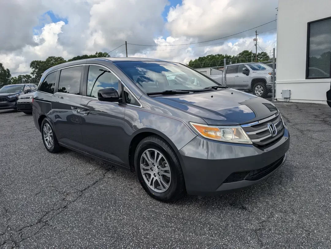 2012 Honda Odyssey EX-L (5FNRL5H68CB) with an Gas V6 3.5L/212 engine, 5-Speed Automatic transmission, located at 1430 Gateway Drive, Opelika, AL, 36801, (334) 239-0944, 32.637871, -85.409790 - 2012 Honda Odyssey EX-L - Photo#2