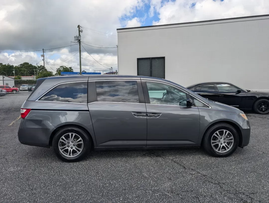 2012 Honda Odyssey EX-L (5FNRL5H68CB) with an Gas V6 3.5L/212 engine, 5-Speed Automatic transmission, located at 1430 Gateway Drive, Opelika, AL, 36801, (334) 239-0944, 32.637871, -85.409790 - 2012 Honda Odyssey EX-L - Photo#3