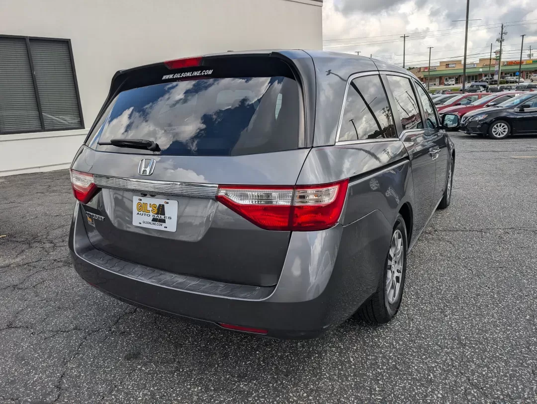 2012 Honda Odyssey EX-L (5FNRL5H68CB) with an Gas V6 3.5L/212 engine, 5-Speed Automatic transmission, located at 1430 Gateway Drive, Opelika, AL, 36801, (334) 239-0944, 32.637871, -85.409790 - 2012 Honda Odyssey EX-L - Photo#4