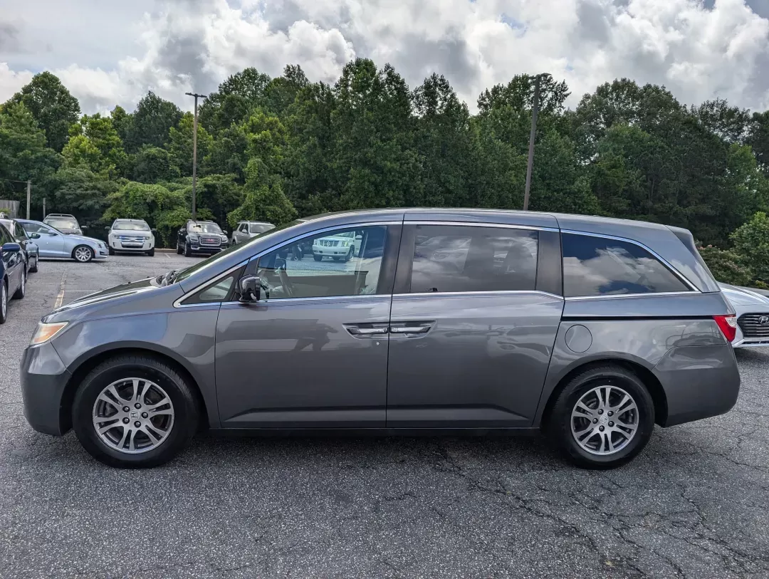 2012 Honda Odyssey EX-L (5FNRL5H68CB) with an Gas V6 3.5L/212 engine, 5-Speed Automatic transmission, located at 1430 Gateway Drive, Opelika, AL, 36801, (334) 239-0944, 32.637871, -85.409790 - 2012 Honda Odyssey EX-L - Photo#7
