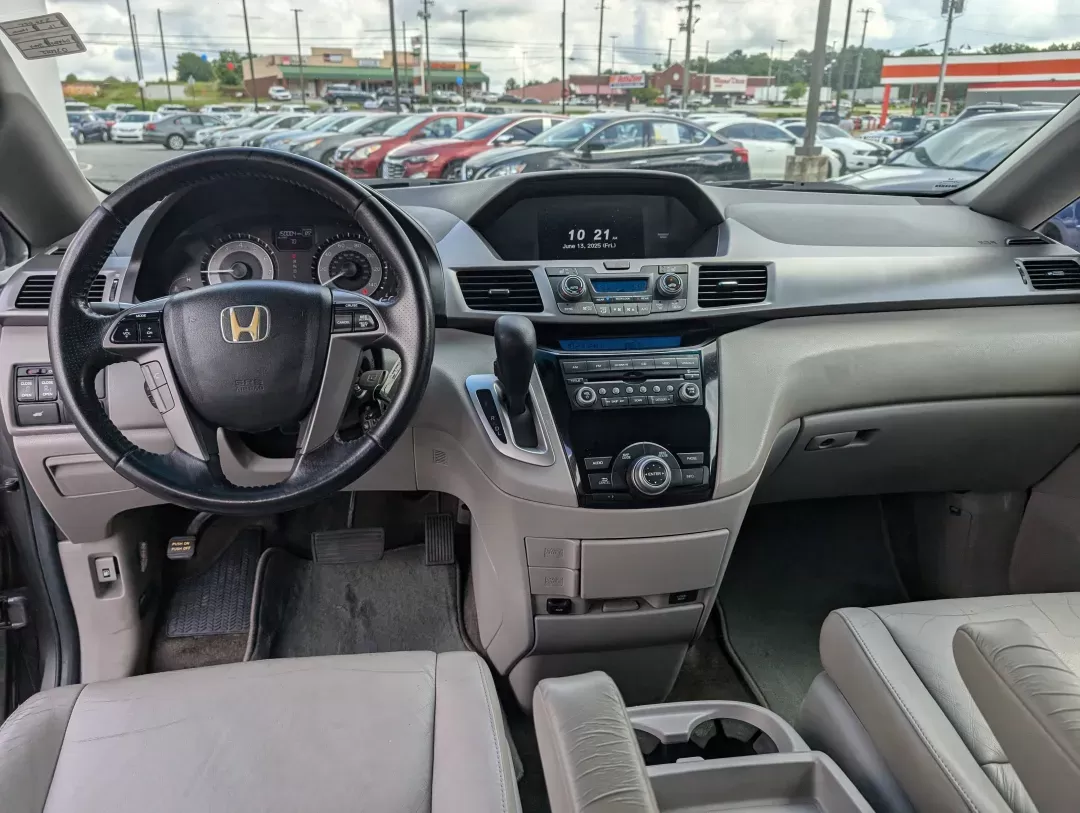 2012 Honda Odyssey EX-L (5FNRL5H68CB) with an Gas V6 3.5L/212 engine, 5-Speed Automatic transmission, located at 1430 Gateway Drive, Opelika, AL, 36801, (334) 239-0944, 32.637871, -85.409790 - 2012 Honda Odyssey EX-L - Photo#12