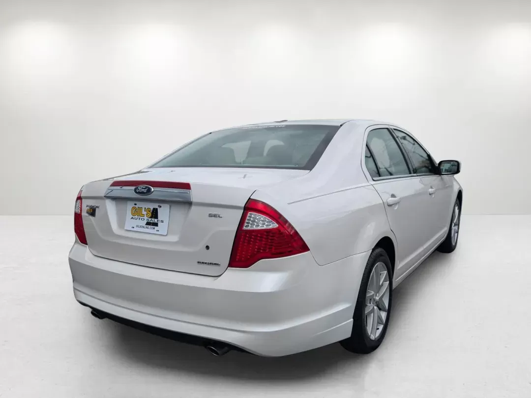 2012 Ford Fusion SEL (3FAHP0JG8CR) with an Other engine, located at 1430 Gateway Drive, Opelika, AL, 36801, (334) 239-0944, 32.637871, -85.409790 - **Discover Your Perfect Ride: 2012 Ford Fusion SEL at Gils Auto in Opelika, AL**<br /> <br /> Are you searching for a reliable sedan that effortlessly combines comfort, style, and practicality? Look no further than this 2012 Ford Fusion SEL, available now at Gils Auto, your trusted Buy Here Pay Here - Photo#4