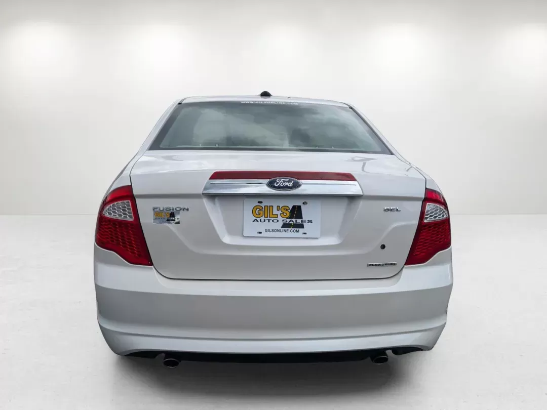 2012 Ford Fusion SEL (3FAHP0JG8CR) with an Other engine, located at 1430 Gateway Drive, Opelika, AL, 36801, (334) 239-0944, 32.637871, -85.409790 - **Discover Your Perfect Ride: 2012 Ford Fusion SEL at Gils Auto in Opelika, AL**<br /> <br /> Are you searching for a reliable sedan that effortlessly combines comfort, style, and practicality? Look no further than this 2012 Ford Fusion SEL, available now at Gils Auto, your trusted Buy Here Pay Here - Photo#5