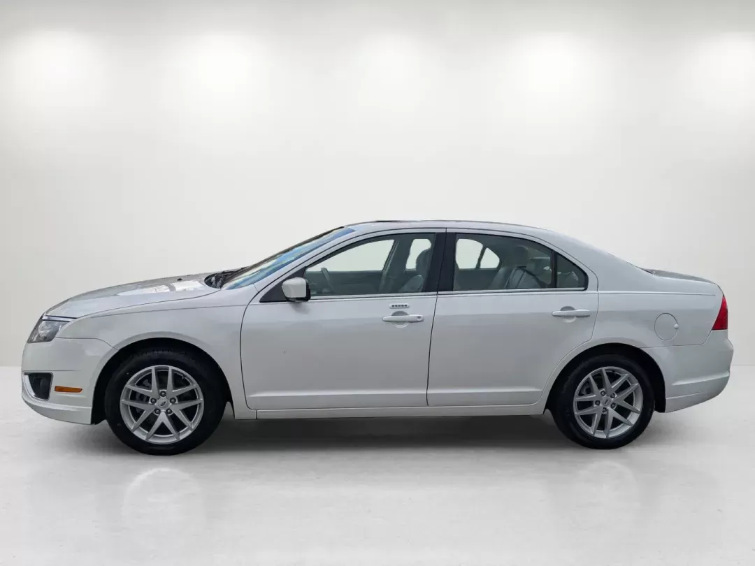 2012 Ford Fusion SEL (3FAHP0JG8CR) with an Other engine, located at 1430 Gateway Drive, Opelika, AL, 36801, (334) 239-0944, 32.637871, -85.409790 - **Discover Your Perfect Ride: 2012 Ford Fusion SEL at Gils Auto in Opelika, AL**<br /> <br /> Are you searching for a reliable sedan that effortlessly combines comfort, style, and practicality? Look no further than this 2012 Ford Fusion SEL, available now at Gils Auto, your trusted Buy Here Pay Here - Photo#7