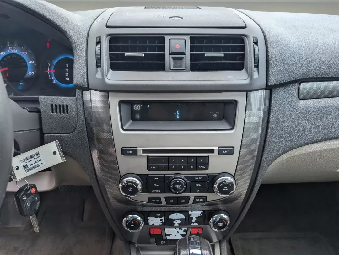 2012 Ford Fusion SEL (3FAHP0JG8CR) with an Other engine, located at 1430 Gateway Drive, Opelika, AL, 36801, (334) 239-0944, 32.637871, -85.409790 - **Discover Your Perfect Ride: 2012 Ford Fusion SEL at Gils Auto in Opelika, AL**<br /> <br /> Are you searching for a reliable sedan that effortlessly combines comfort, style, and practicality? Look no further than this 2012 Ford Fusion SEL, available now at Gils Auto, your trusted Buy Here Pay Here - Photo#14