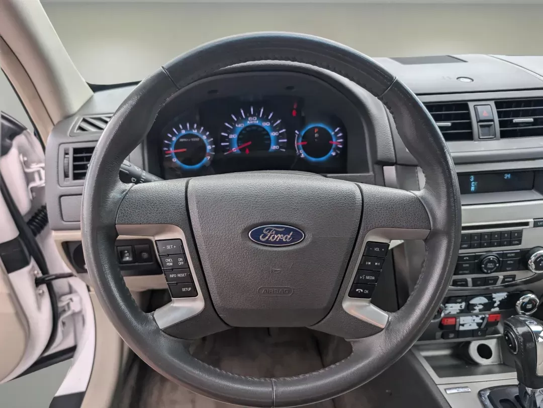 2012 Ford Fusion SEL (3FAHP0JG8CR) with an Other engine, located at 1430 Gateway Drive, Opelika, AL, 36801, (334) 239-0944, 32.637871, -85.409790 - **Discover Your Perfect Ride: 2012 Ford Fusion SEL at Gils Auto in Opelika, AL**<br /> <br /> Are you searching for a reliable sedan that effortlessly combines comfort, style, and practicality? Look no further than this 2012 Ford Fusion SEL, available now at Gils Auto, your trusted Buy Here Pay Here - Photo#15