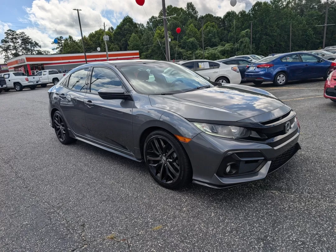 2020 Honda Civic Hatchback Sport (SHHFK7H46LU) with an Other engine, located at 3959 U.S. 80 W, Phenix City, AL, 36870, (334) 297-4885, 32.469296, -85.135185 - **Discover the Perfect Blend of Style and Efficiency: 2020 Honda Civic Hatchback Sport at Gils Auto - Opelika**<br /> <br /> Are you looking for a vehicle that effortlessly fits into your active lifestyle? Whether you're commuting to work, running errands around Opelika, or embarking on weekend geta - Photo#2