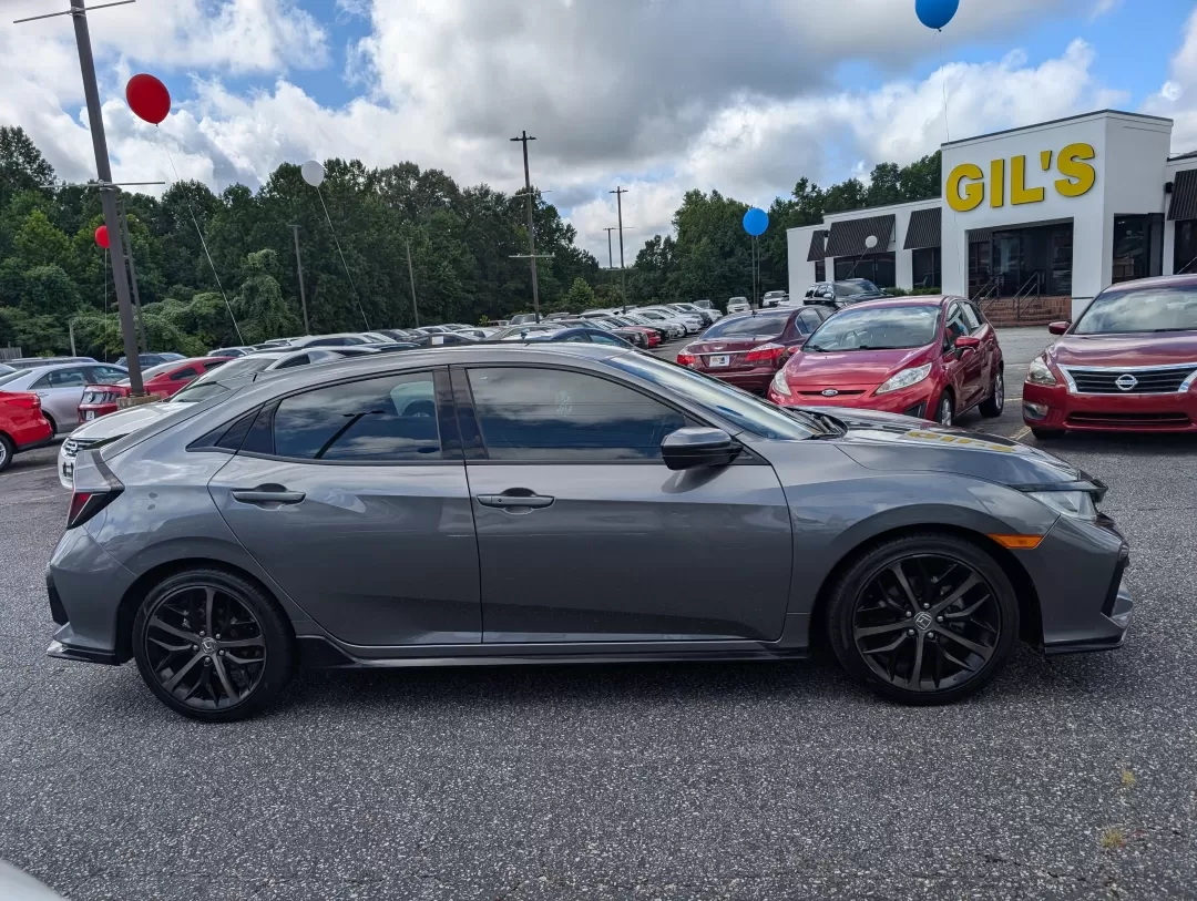 2020 Honda Civic Hatchback Sport (SHHFK7H46LU) with an Other engine, located at 3959 U.S. 80 W, Phenix City, AL, 36870, (334) 297-4885, 32.469296, -85.135185 - **Discover the Perfect Blend of Style and Efficiency: 2020 Honda Civic Hatchback Sport at Gils Auto - Opelika**<br /> <br /> Are you looking for a vehicle that effortlessly fits into your active lifestyle? Whether you're commuting to work, running errands around Opelika, or embarking on weekend geta - Photo#3