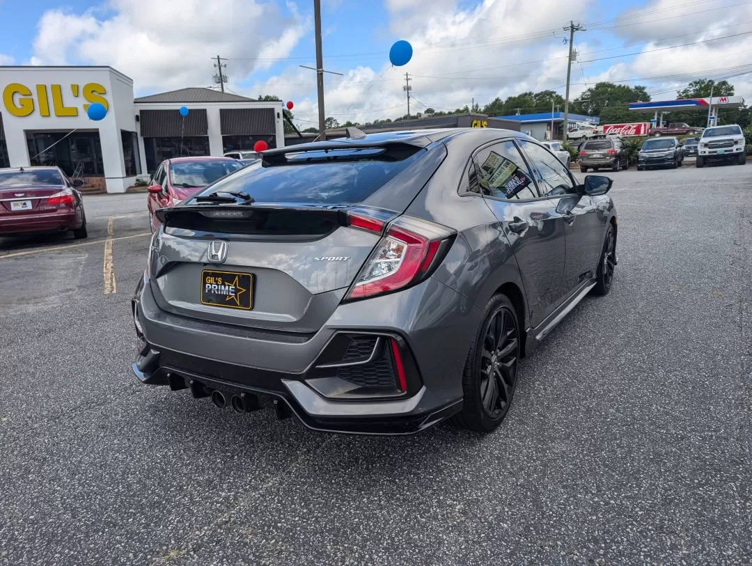 2020 Honda Civic Hatchback Sport (SHHFK7H46LU) with an Other engine, located at 3959 U.S. 80 W, Phenix City, AL, 36870, (334) 297-4885, 32.469296, -85.135185 - **Discover the Perfect Blend of Style and Efficiency: 2020 Honda Civic Hatchback Sport at Gils Auto - Opelika**<br /> <br /> Are you looking for a vehicle that effortlessly fits into your active lifestyle? Whether you're commuting to work, running errands around Opelika, or embarking on weekend geta - Photo#4